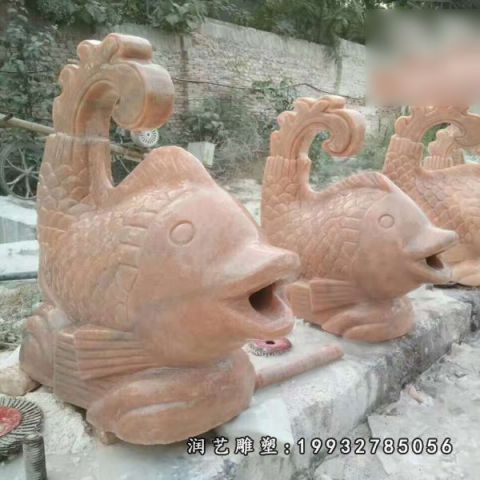 草坪晚霞红鱼动物雕塑